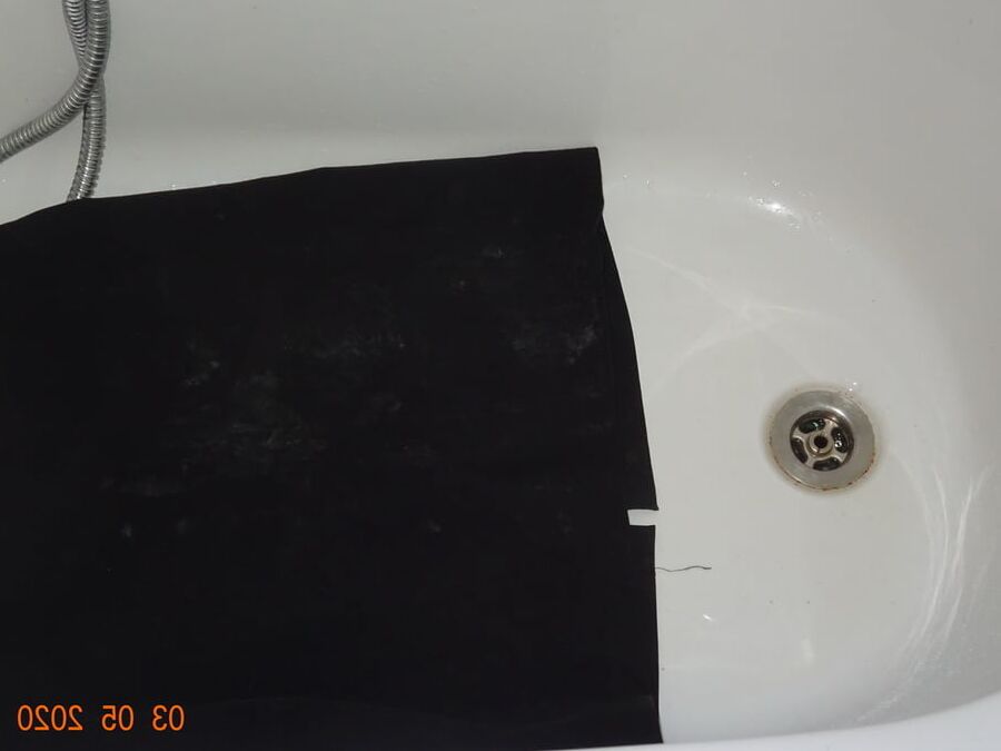 piss on black skirt