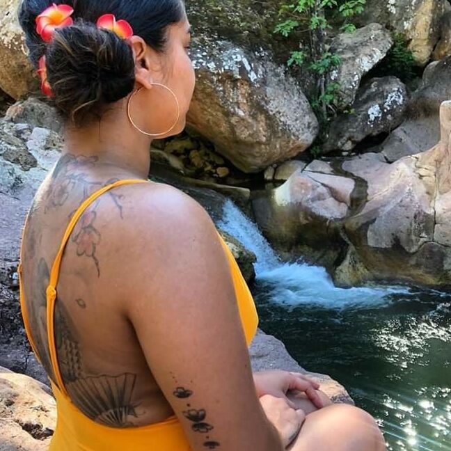 Tatooed girls in swimsuit