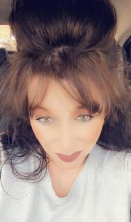 Sexy Milf With Big Hair.