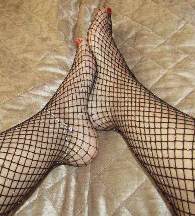 Camera Shy Milf in Fishnets