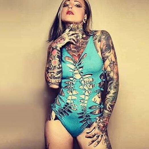 Tatooed girls in swimsuit