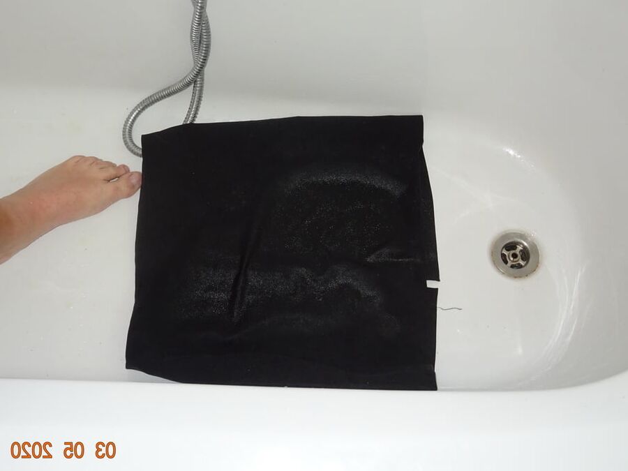 piss on black skirt