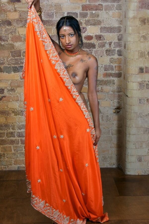 Asha stripping her saree