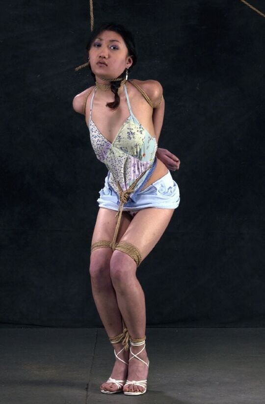 Submissive chink whore in bondage for our use