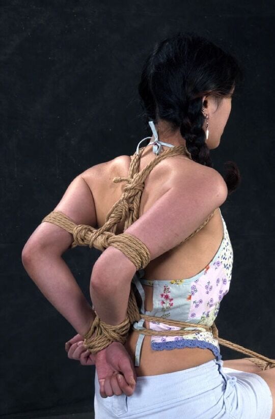 Submissive chink whore in bondage for our use