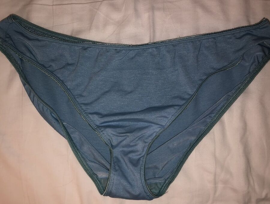My cock, wife down pants and a pile of dirty panties