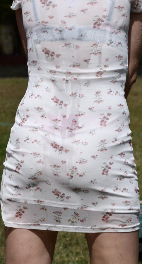 Wets her tight dress, strips and fingers
