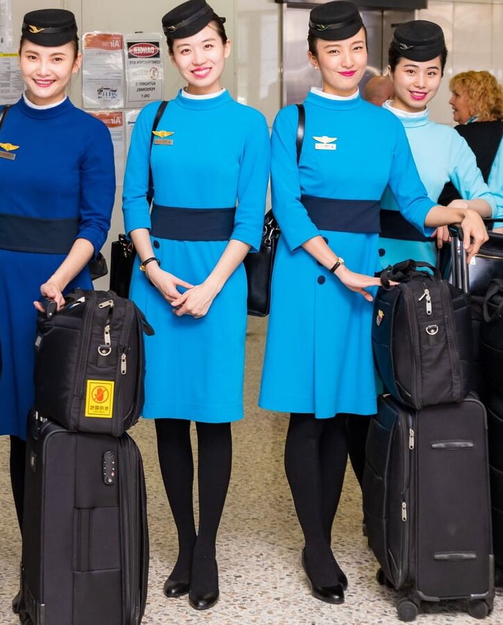 Asian Flight Attendants in Pantyhose Part