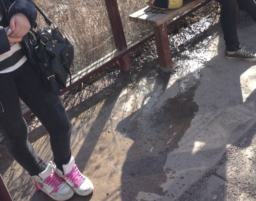 My piss puddles at the bus stop