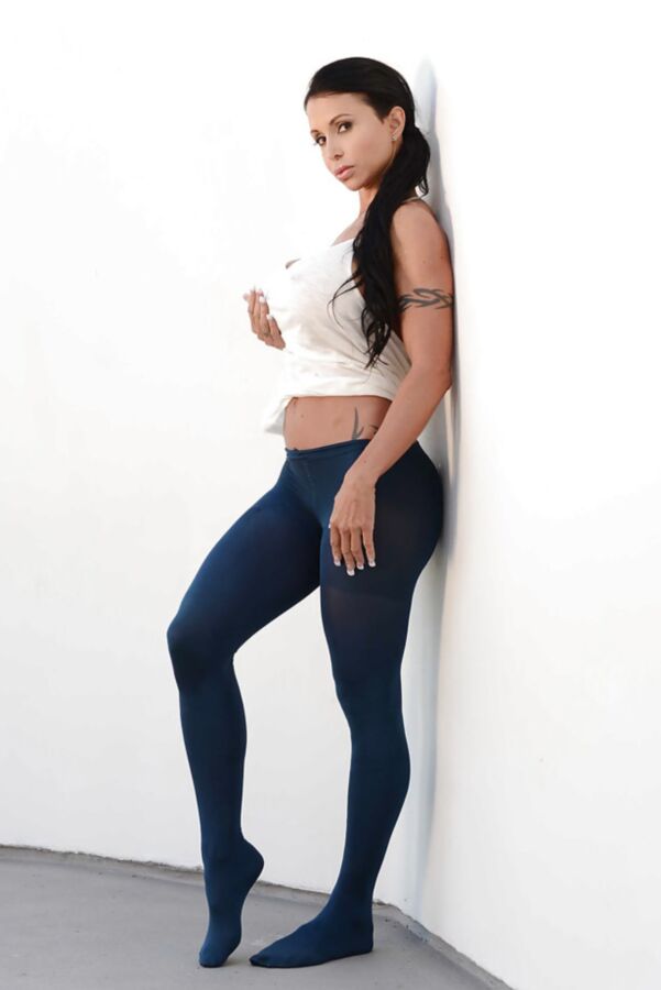 Dark haired Beauty Posing