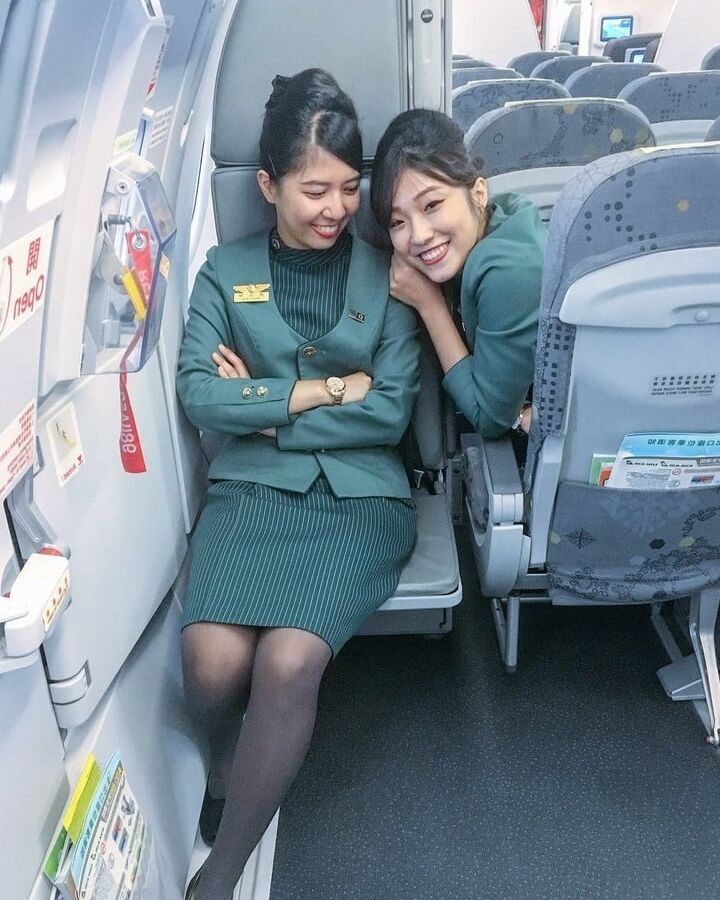 Asian Flight Attendants in Pantyhose Part