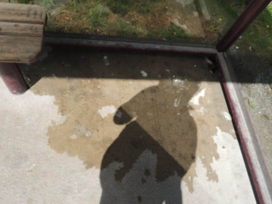 My piss puddles at the bus stop