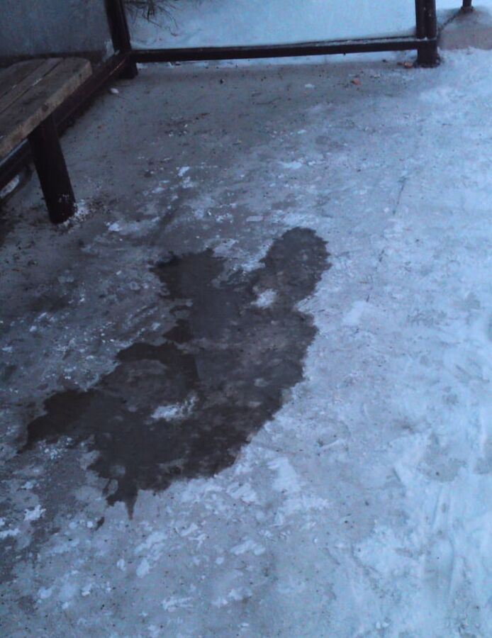 My piss puddles at the bus stop