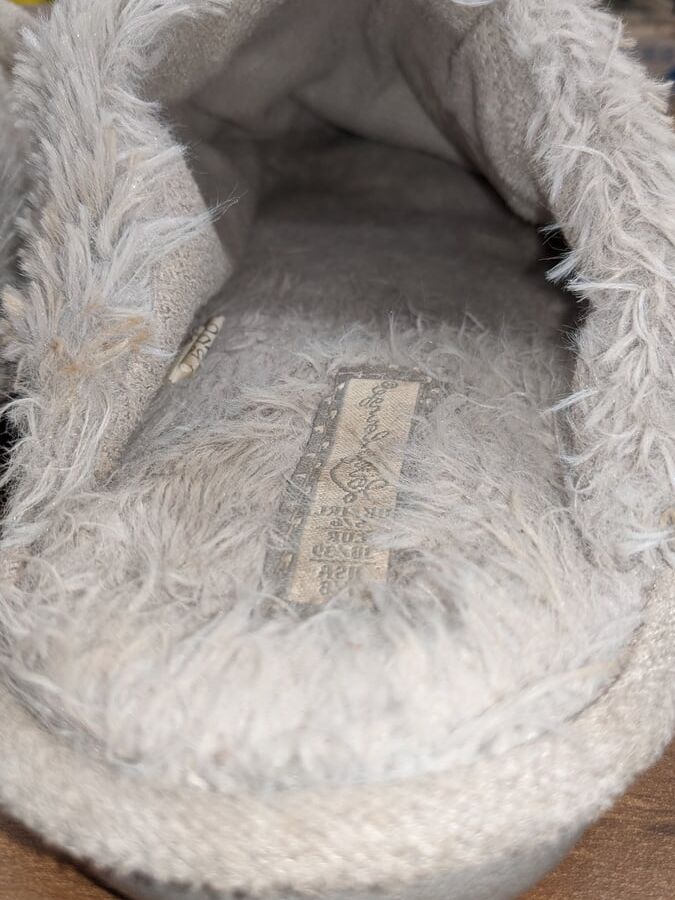 Abandoned girls slippers