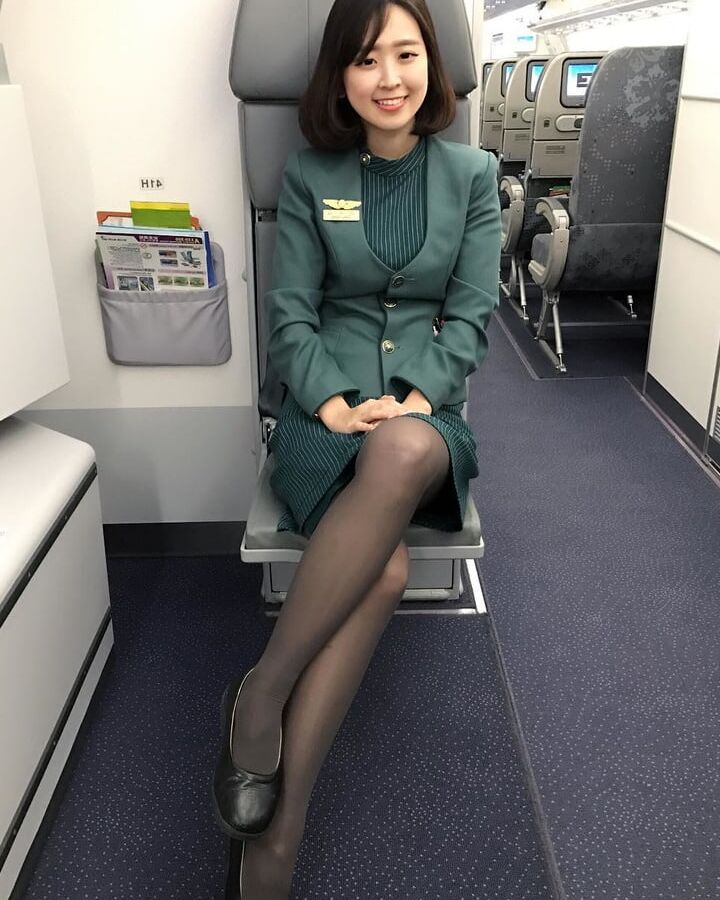 Asian Flight Attendants in Pantyhose Part