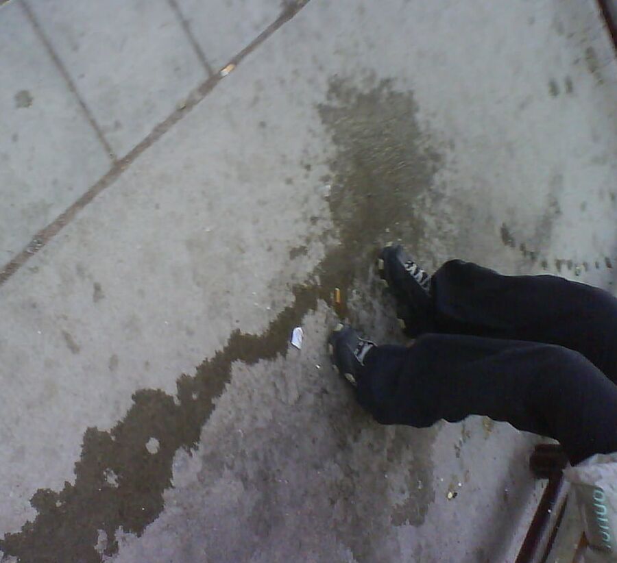 My piss puddles at the bus stop