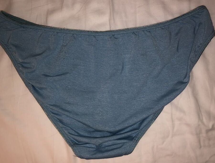 My cock, wife down pants and a pile of dirty panties