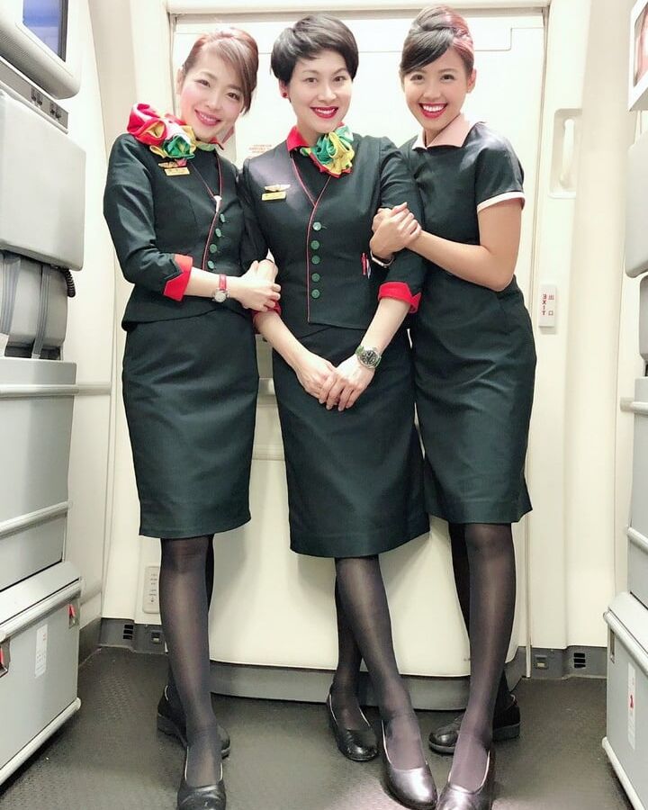Asian Flight Attendants in Pantyhose Part