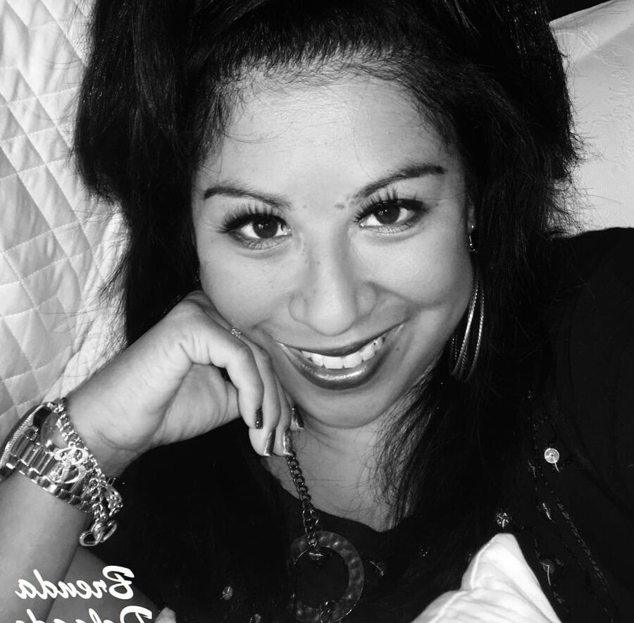 Brenda Delgado (Rob&;s wife)