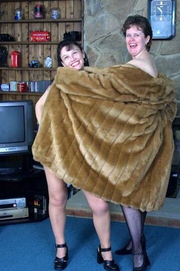 Two matures in fur coat