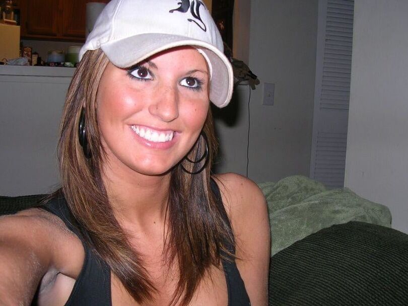 Sexy brunette with big fake tits having threesome