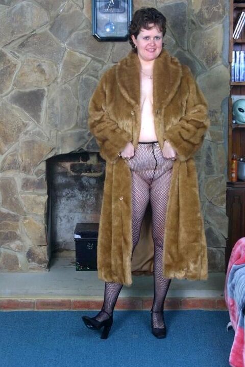 Two matures in fur coat