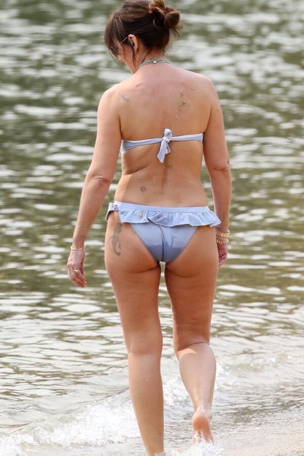 Davina McCall in light blue bikini.