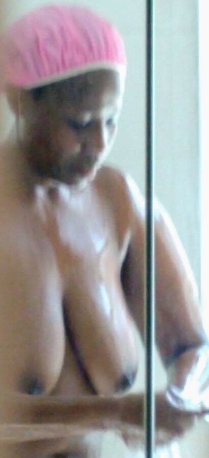Wife washing her big tits
