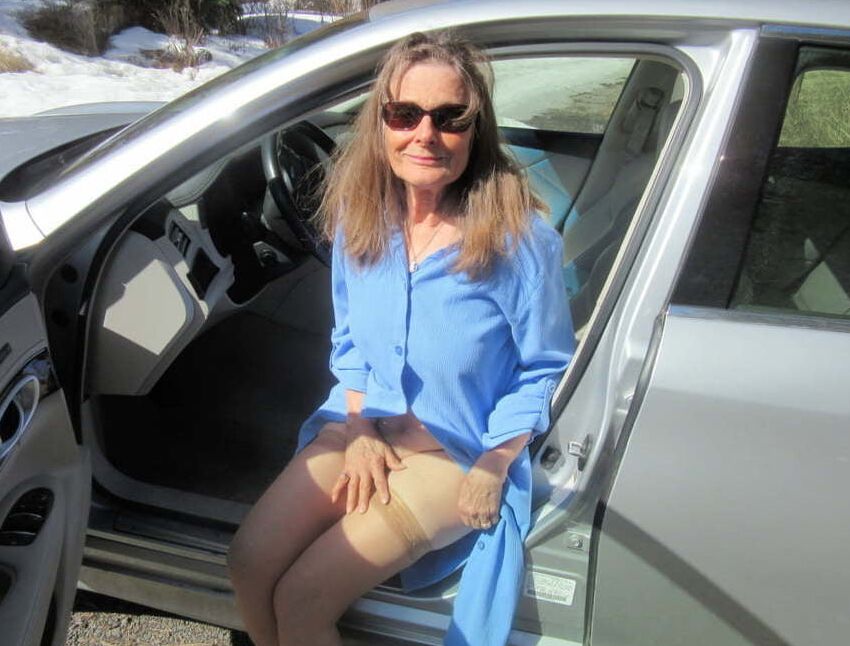 women flashing in cars