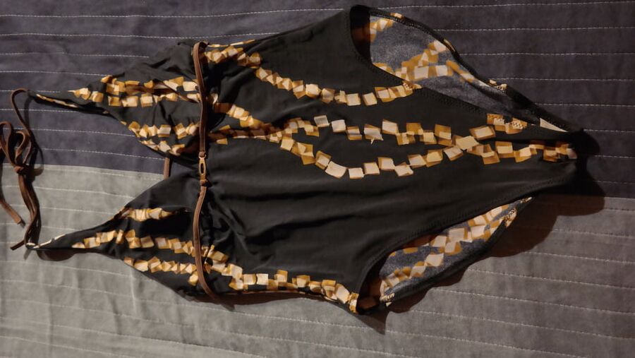 My mom&;s swimsuits and a bodysuit.