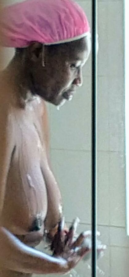 Wife washing her big tits