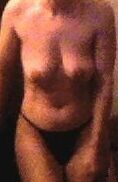 Hanger under shower has a trimmed pussy