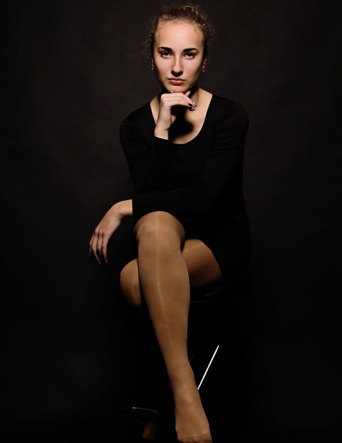 Tidy Russian Bitch Posing in Tan Pantyhose