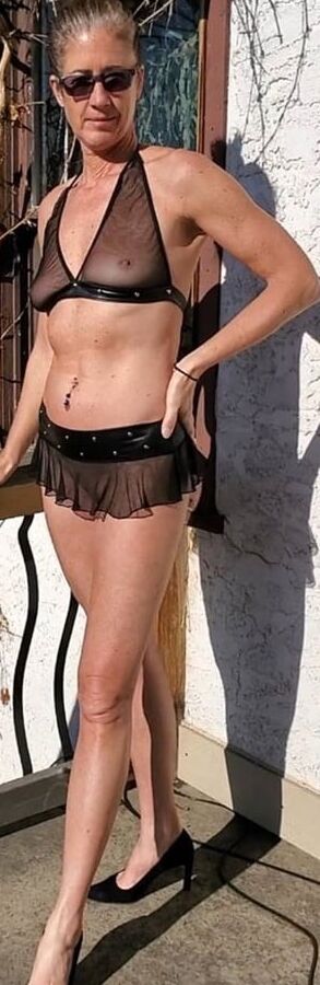 Horny amateur mature shows nipples outside