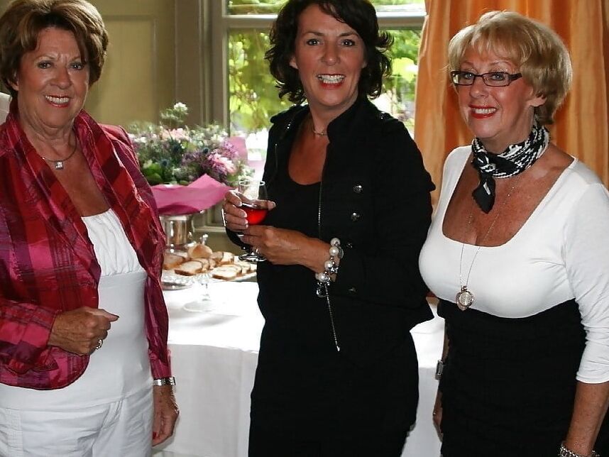 Sexy clothed mature ladies