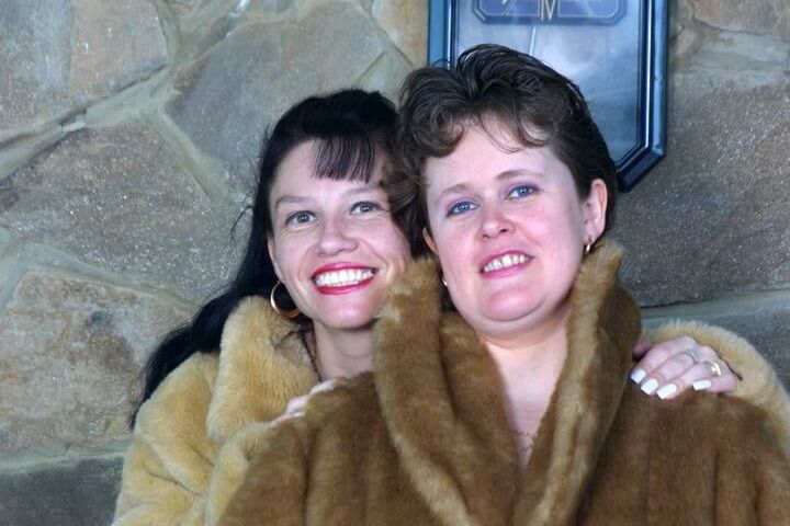Two matures in fur coat