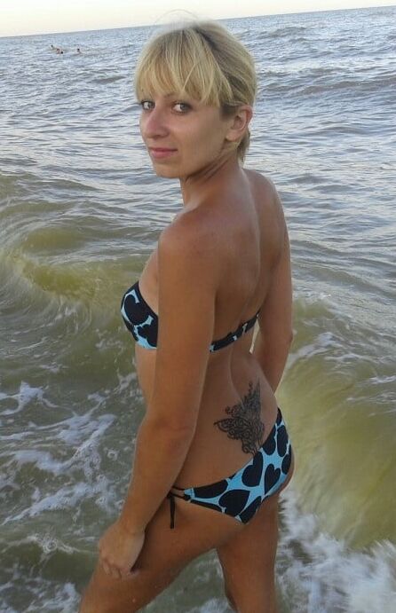 Tidy Russian Bitch Posing in Tan Pantyhose