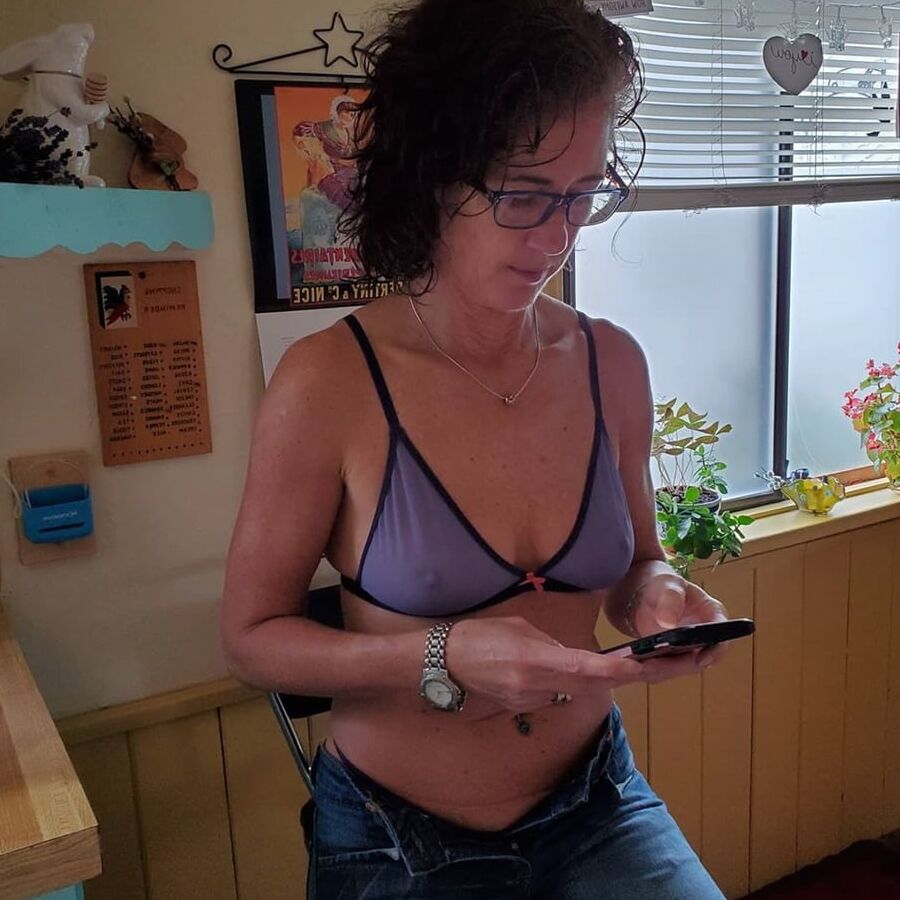 Horny amateur mature teasing in kitchen