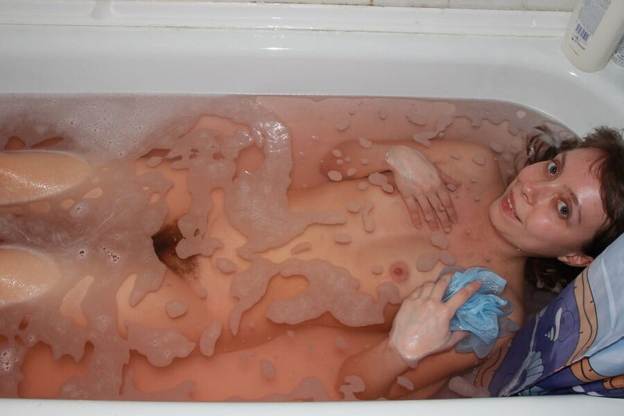 Bath time for a sexy mature woman