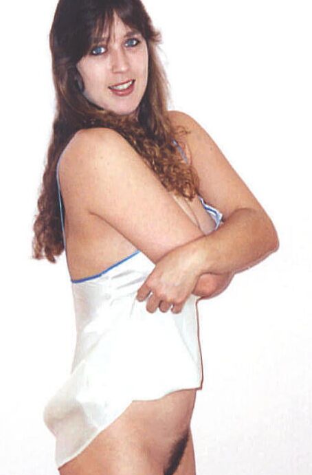 Crystal in her white silk teddy