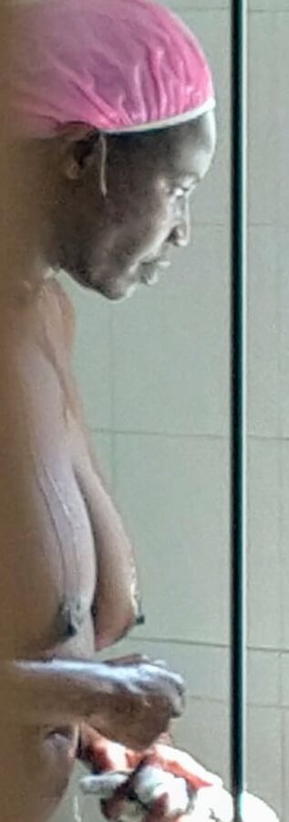 Wife washing her big tits