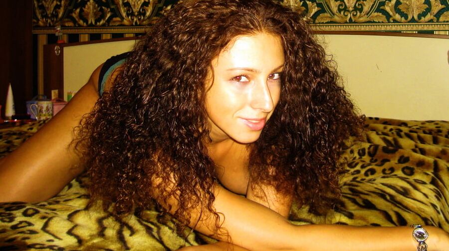 Wild curly brunette