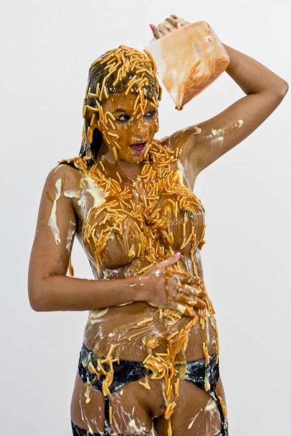 Messy girls covered in goo