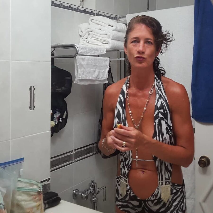 Horny amateur mature teasing in bathroom