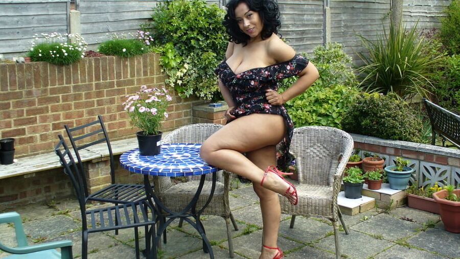 Donna Ambrose Wearing Printed Dress On The Patio Non Nude