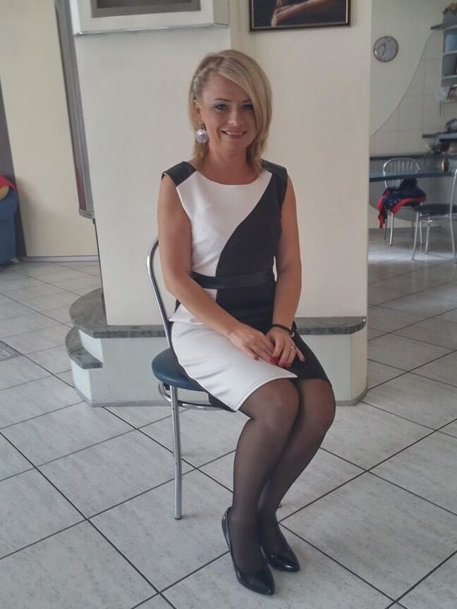 Clothed mature blonde (friend of my wife)