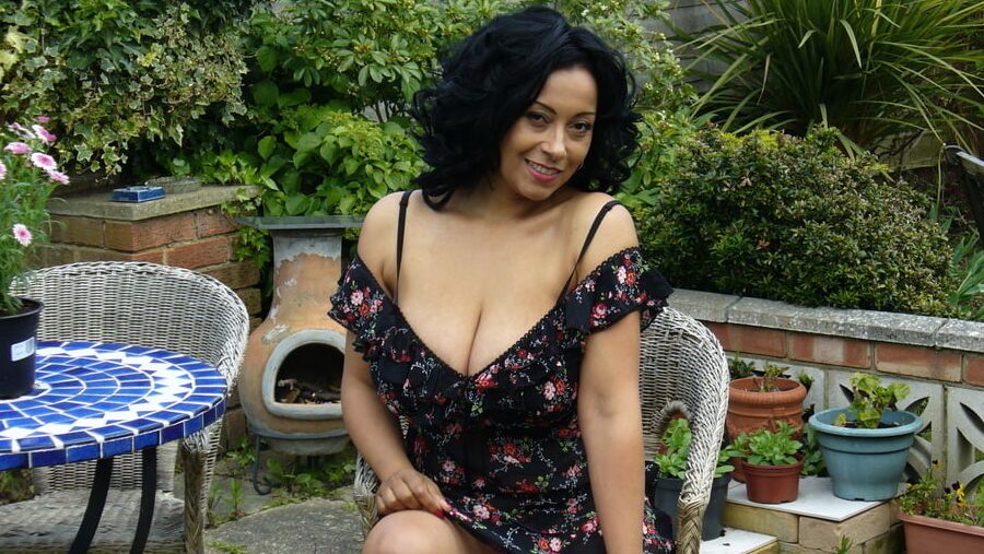 Donna Ambrose Wearing Printed Dress On The Patio Non Nude