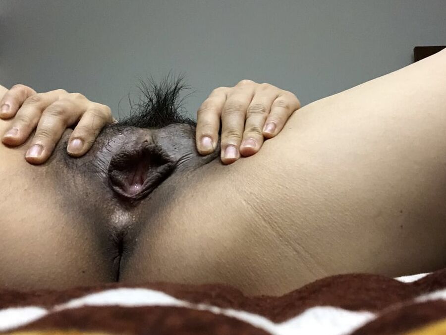 Pregnant Asian wife spreading