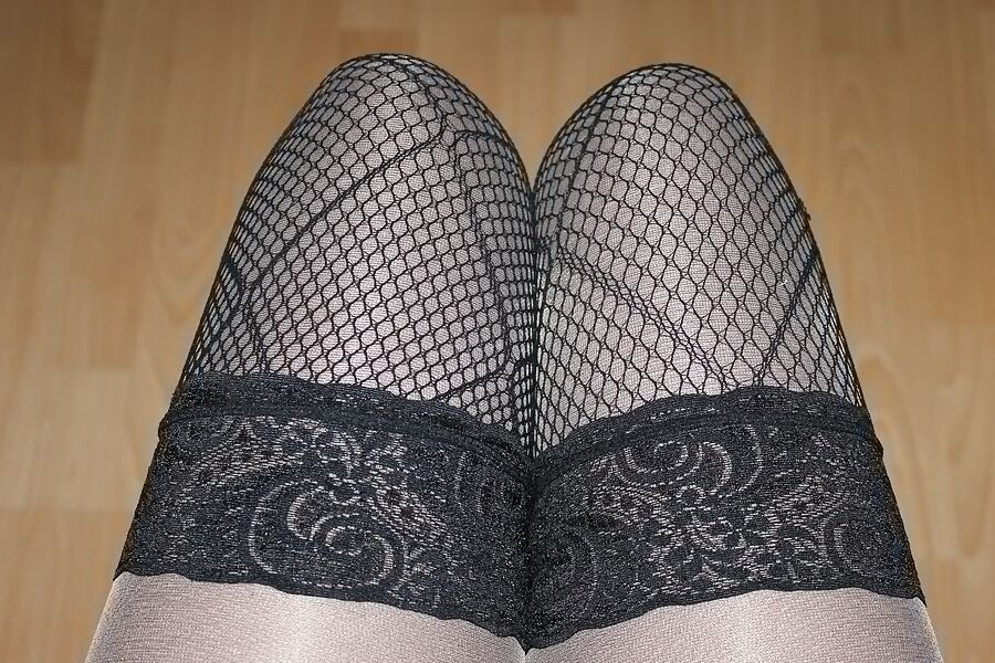 shiny pantyhose over brown stockings