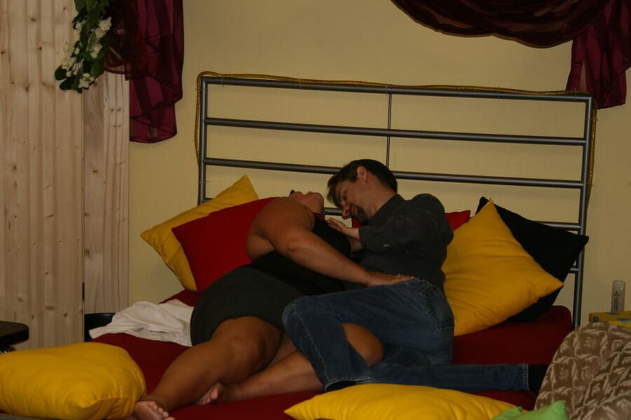 Anna has a young guy over and sucks his big bent cock until